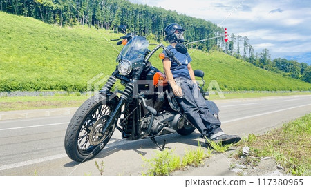 Touring bike rider 117380965