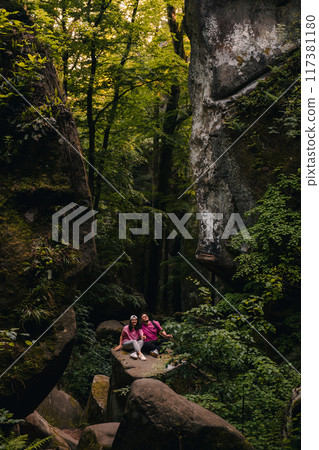 couple tourists hiking at canyon in the forest couple tourists hiking at canyon in the forest 117381180