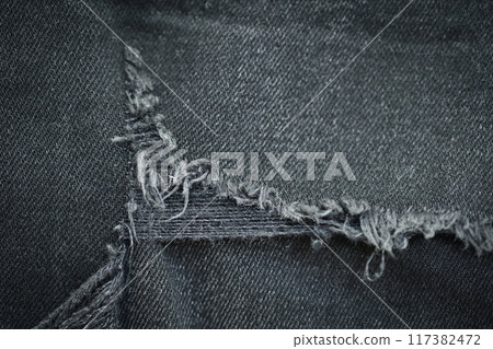 torn black danim texture background, textile of jeans fashion for clothing design 117382472