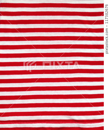 Red and white style striped fabric texture. Background with striped closeup weave fabric. Pinstripe material of red and white color Red and white style striped fabric texture. Background with striped closeup weave fabric. Pinstripe material of red and white color 117382676