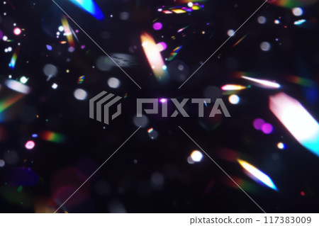 Colorful rainbow crystal light leaks sparkling bokeh on black background 117383009