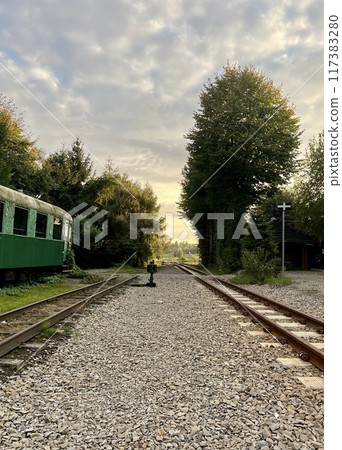 Abandoned train station at sunset in Bachorz, Podcapackie, Poland 117383280