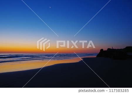 Scenery of Usuiso Beach and Shioyazaki Lighthouse with calm waves lapping against the backdrop of the morning sky Ver1 Scenery of Usuiso Beach and Shioyazaki Lighthouse with calm waves lapping against the backdrop of the morning sky Ver1 117383285