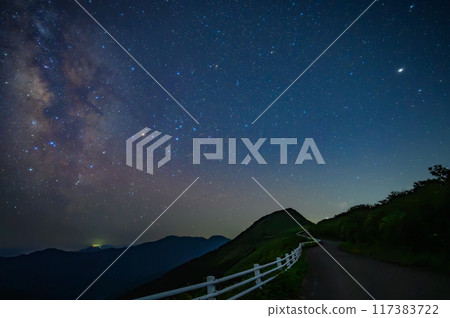 Starry sky and mountain path: Beautiful galaxy and night sky scenery Starry sky and mountain path: Beautiful galaxy and night sky scenery 117383722