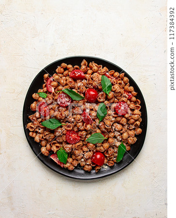 Tuscan pasta with smoked paprika and basil,parmesan cheese, Italian traditional cuisine, 117384392