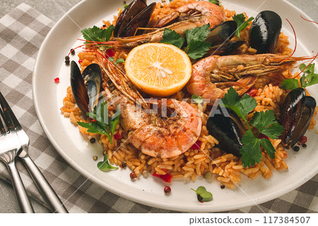 Seafood paella, shrimp and mussels risotto, rice, homemade, top view, no people, Seafood paella, shrimp and mussels risotto, rice, homemade, top view, no people, 117384507