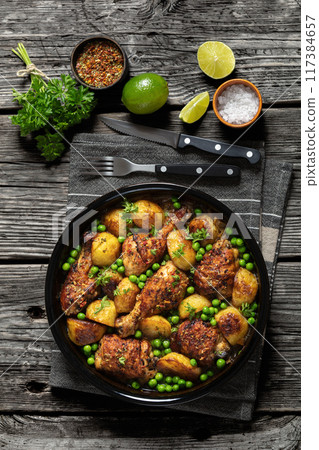 Chicken Vesuvio in a baking dish, top view Chicken Vesuvio in a baking dish, top view 117384657