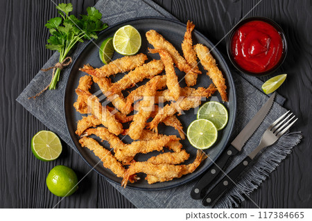 deep fried panko breaded shrimp on a plate 117384665