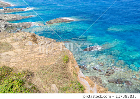 The magnificent view of Tategami Rock in Yonaguni The magnificent view of Tategami Rock in Yonaguni 117385833