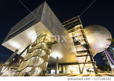 Building view of the Taipei Performing Arts Center in Taiwan. it's a modern building combining cube and sphere geometry. Building view of the Taipei Performing Arts Center in Taiwan. it's a modern building combining cube and sphere geometry. 117386382