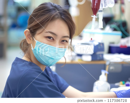 A nurse preparing to take blood 117386728