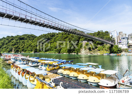 Beautiful view of Bitan Scenic Area in New Taipei City, Taiwan. it's one of the eight famous attractions in Taiwan. Beautiful view of Bitan Scenic Area in New Taipei City, Taiwan. it's one of the eight famous attractions in Taiwan. 117386789