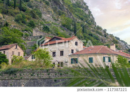 Kotor, Montenegro old town houses at dusk 117387221