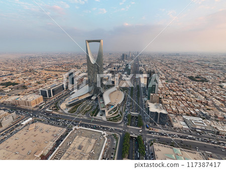 Drone shot flying. Saudi Arabia. Riyadh. Road. Day. Kingdom tower Drone shot flying. Saudi Arabia. Riyadh. Road. Day. Kingdom tower 117387417