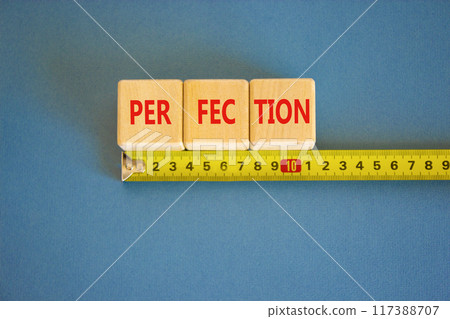 Perfection symbol. Concept word Perfection on beautiful wooden blocks. Beautiful blue background. Beautiful yellow ruler. Business perfection concept. Copy space. Perfection symbol. Concept word Perfection on beautiful wooden blocks. Beautiful blue background. Beautiful yellow ruler. Business perfection concept. Copy space. 117388707