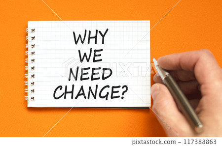 Why we need change symbol. Concept words Why we need change on beautiful white note. Beautiful orange background. Voter hand. Business and why we need change concept. Copy space. 117388863