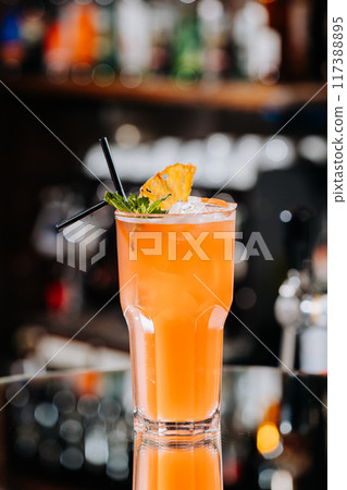 Refreshing tropical cocktail with pineapple garnish, perfect for summer vibes and bar scenes Refreshing tropical cocktail with pineapple garnish, perfect for summer vibes and bar scenes 117388895