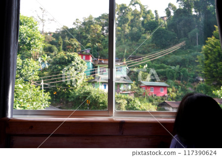Morning nature view of Mountain throught Window at East Sikkim Morning nature view of Mountain throught Window at East Sikkim 117390624