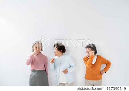 Dental care toothbrush senior woman Dental care toothbrush senior woman 117390849