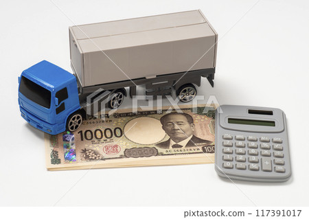 Image of long-distance transport freight with trailer, money and calculator Image of long-distance transport freight with trailer, money and calculator 117391017