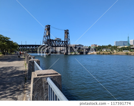 Portland, Oregon, USA - 07.10.2024: View of the Steel Bridge across the Willamette River. Portland, Oregon, USA. 117391774