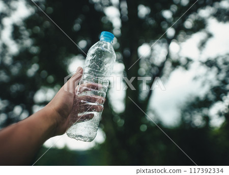 Recycle concept, plastic water bottles on the lawn Recycle concept, plastic water bottles on the lawn 117392334