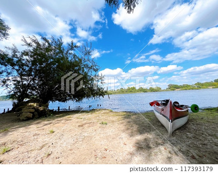 Boat floating on the beach Boat floating on the beach 117393179