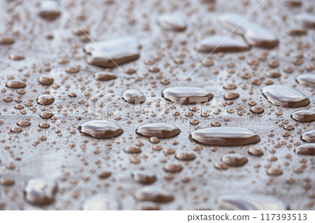 Rain drops detail on waterproof sail Rain drops detail on waterproof sail 117393513