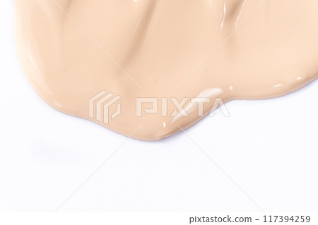 Flow foundation on a white background, art in cosmetics. 117394259