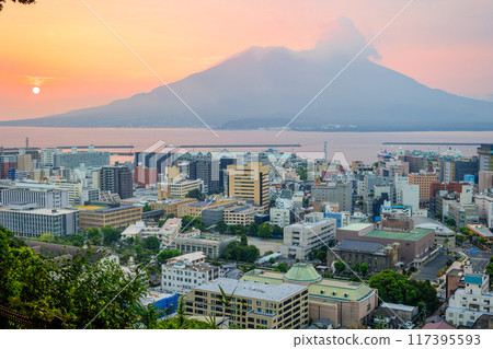 Sakurajima and Kagoshima cityscape seen from Shiroyama Park Observatory: Sunrise and magic hour 117395593
