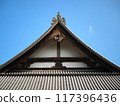 The roof of the temple stands out against the blue sky 117396436