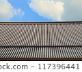 Roof tile and sky 117396441