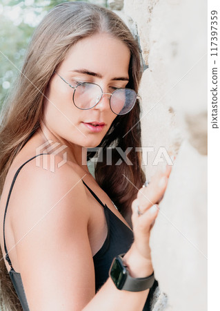 Woman summer travel. Happy tourist enjoy taking selfie photo outdoors for memories. Woman traveler posing in summer park on sunset, sharing travel adventure journey Woman summer travel. Happy tourist enjoy taking selfie photo outdoors for memories. Woman traveler posing in summer park on sunset, sharing travel adventure journey 117397359