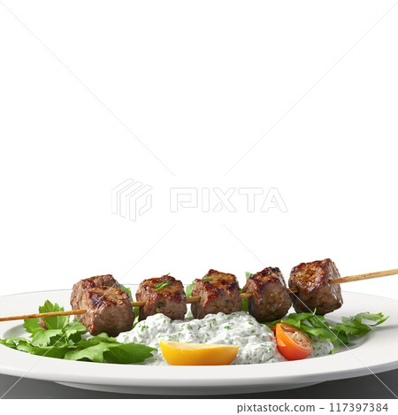 Lamb kebab chunks on skewers tzatziki dripping Food and Culinary concept 117397384