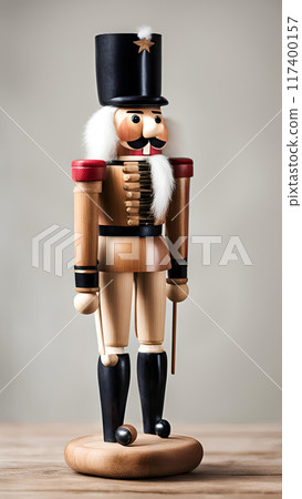Wooden nutcracker on the table as decoration 117400157