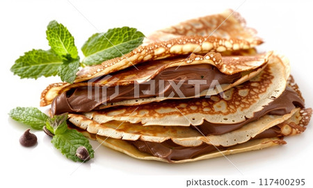 repes filled with chocolate spread and mint leaves. 117400295