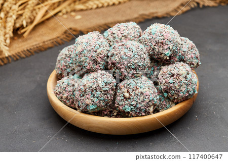 Colorful chocolate truffles with a crunchy coating, perfect for a festive and indulgent treat 117400647
