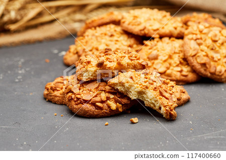 Crunchy almond cookies, freshly baked and ready to satisfy your sweet cravings 117400660