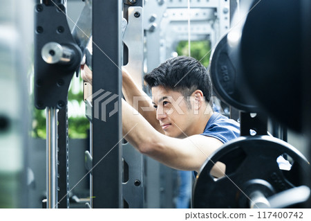 Sports gym, training gym, male, muscle training, portrait Sports gym, training gym, male, muscle training, portrait 117400742