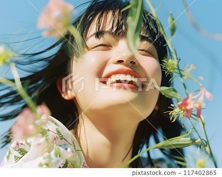 A natural Asian woman bathed in the spring sunshine A natural Asian woman bathed in the spring sunshine 117402865