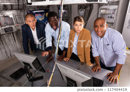 People in panic are looking for solution to the puzzle in quest room 117404419