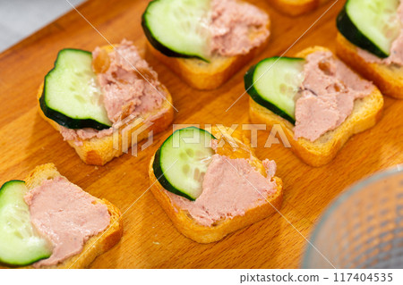 Sandwich with pate and cucumber slice Sandwich with pate and cucumber slice 117404535