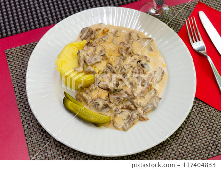 Stewed veal with sour cream is beef stroganoff, dish of Russian cuisine Stewed veal with sour cream is beef stroganoff, dish of Russian cuisine 117404833