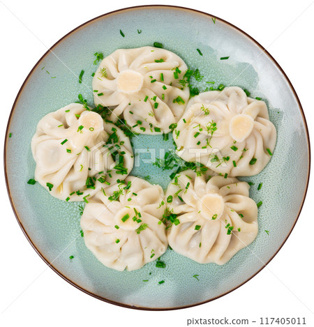 Boiled Khinkali dumplings sprinkled with chopped dill Boiled Khinkali dumplings sprinkled with chopped dill 117405011
