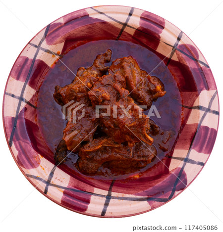 Dish of Tunisian cuisine is tajine. Baked lamb meat cooked in fragrant gravy with vegetables Dish of Tunisian cuisine is tajine. Baked lamb meat cooked in fragrant gravy with vegetables 117405086