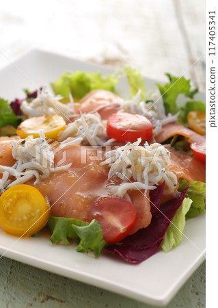 Fish carpaccio is a typical example of a Japanese take on Western cuisine. Fish carpaccio is a typical example of a Japanese take on Western cuisine. 117405341