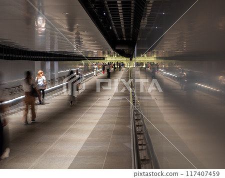 Tokyo cityscape: People walking through an underground passage in the city center 117407459