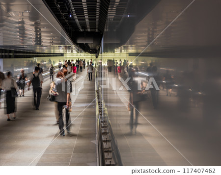 Tokyo cityscape: People walking through an underground passage in the city center 117407462