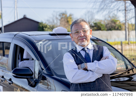 Middle-aged male taxi driver 117407998