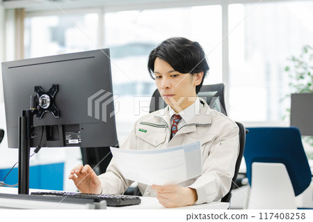 Man in work clothes designer developer image Man in work clothes designer developer image 117408258